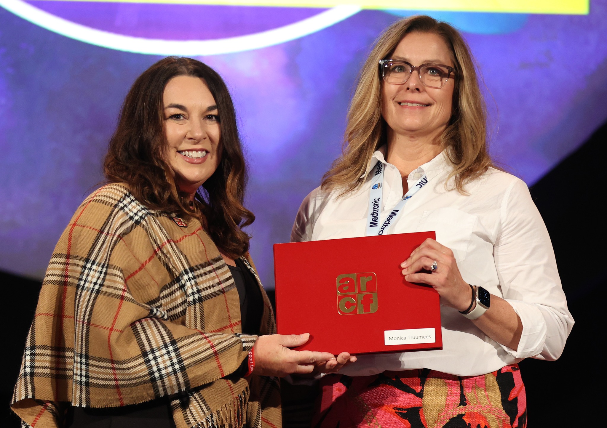  Monica Truumees is pictured on the right receiving her merited award from Tonya A. Winders.